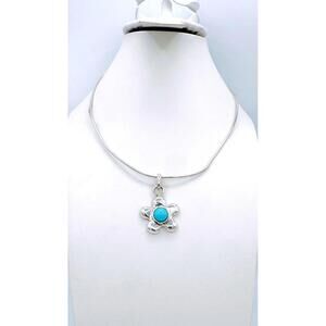 Sterling silver wire chain with sterling turquoise cabochon daisy style flower